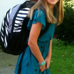 Girls dress with horse and heart pattern